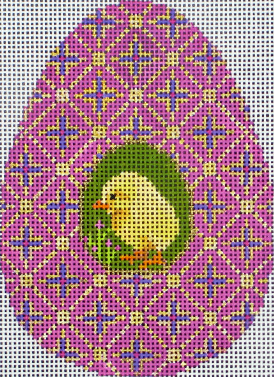 Amanda Lawford Easter egg shaped needlepoint canvas with chick on a purple geometric background