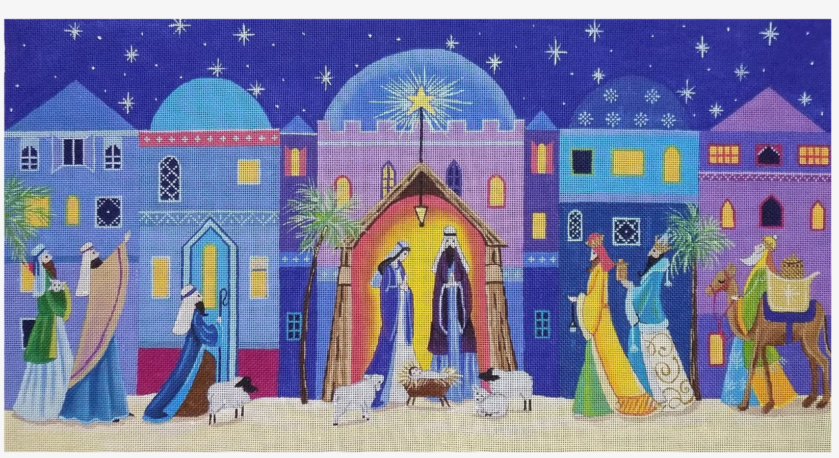 Love You More needlepoint canvas of a manger nativity scene in front of the skyline of Bethlehem in vibrant colors with Mary, Joseph, Jesus, the wise men, and shepherds